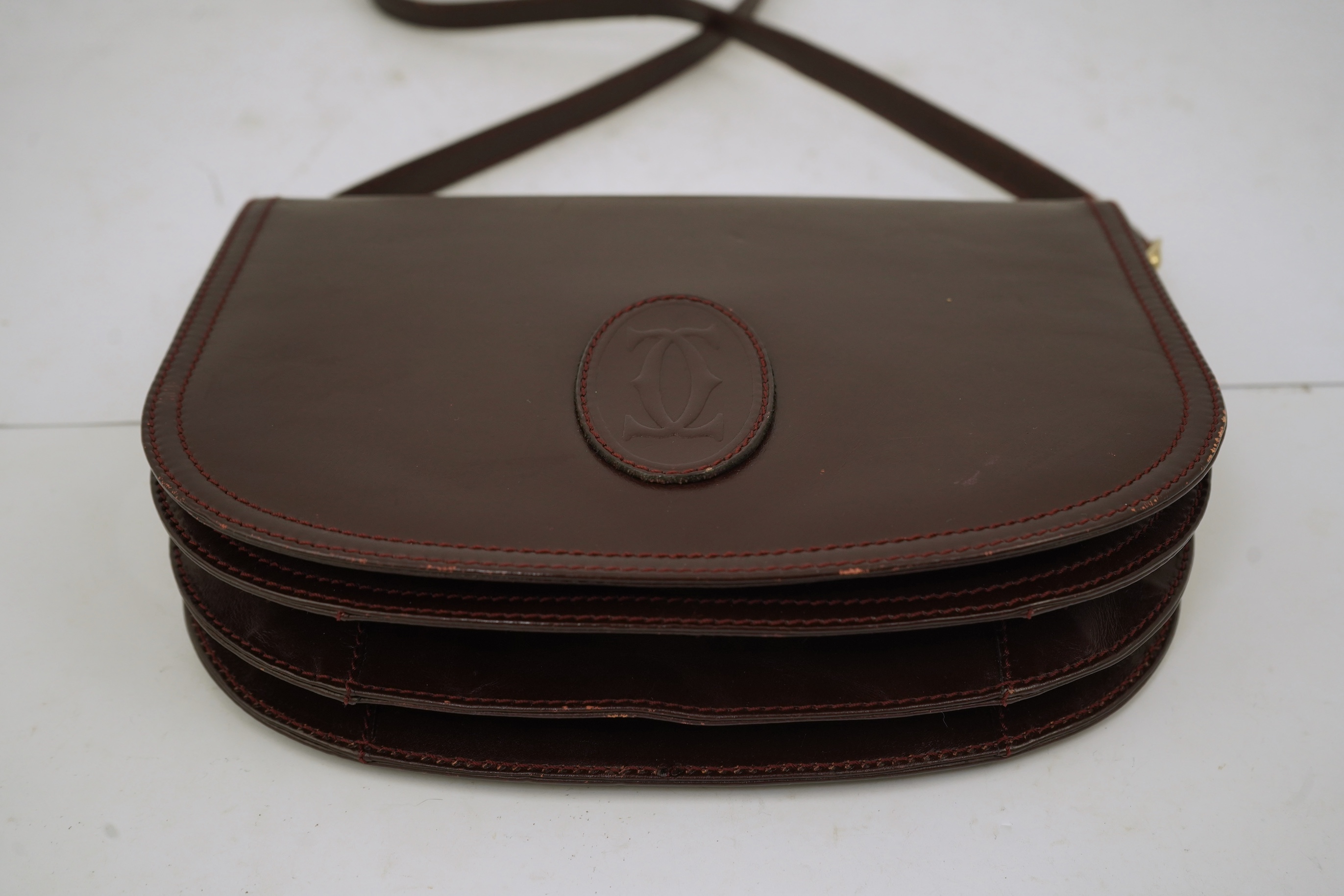 A Cartier leather shoulder bag